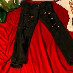 Black jeans with flames  from rue 21 skinny supreme flex size 32/32
